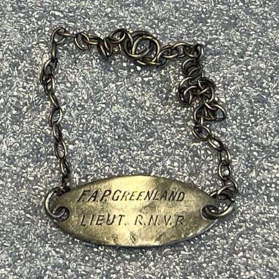115) Small WW1 WW2 White Metal Wrist ID Tag to Lieut F.A.P.Greenland RNVR